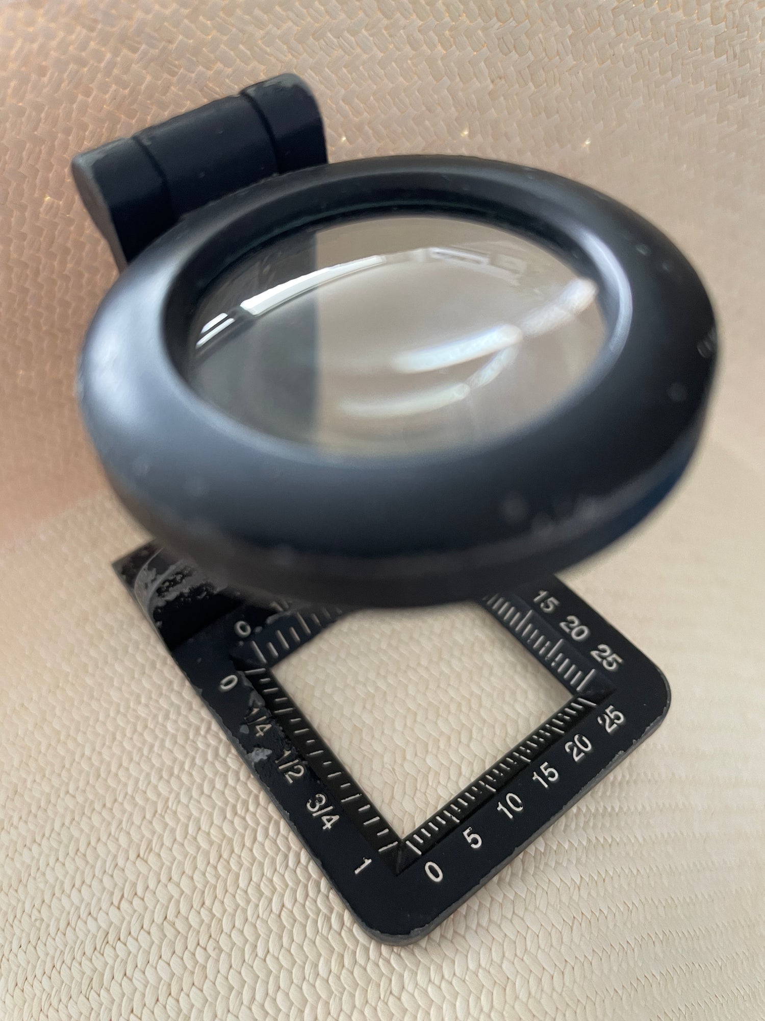 Panama hat with magnifying glass