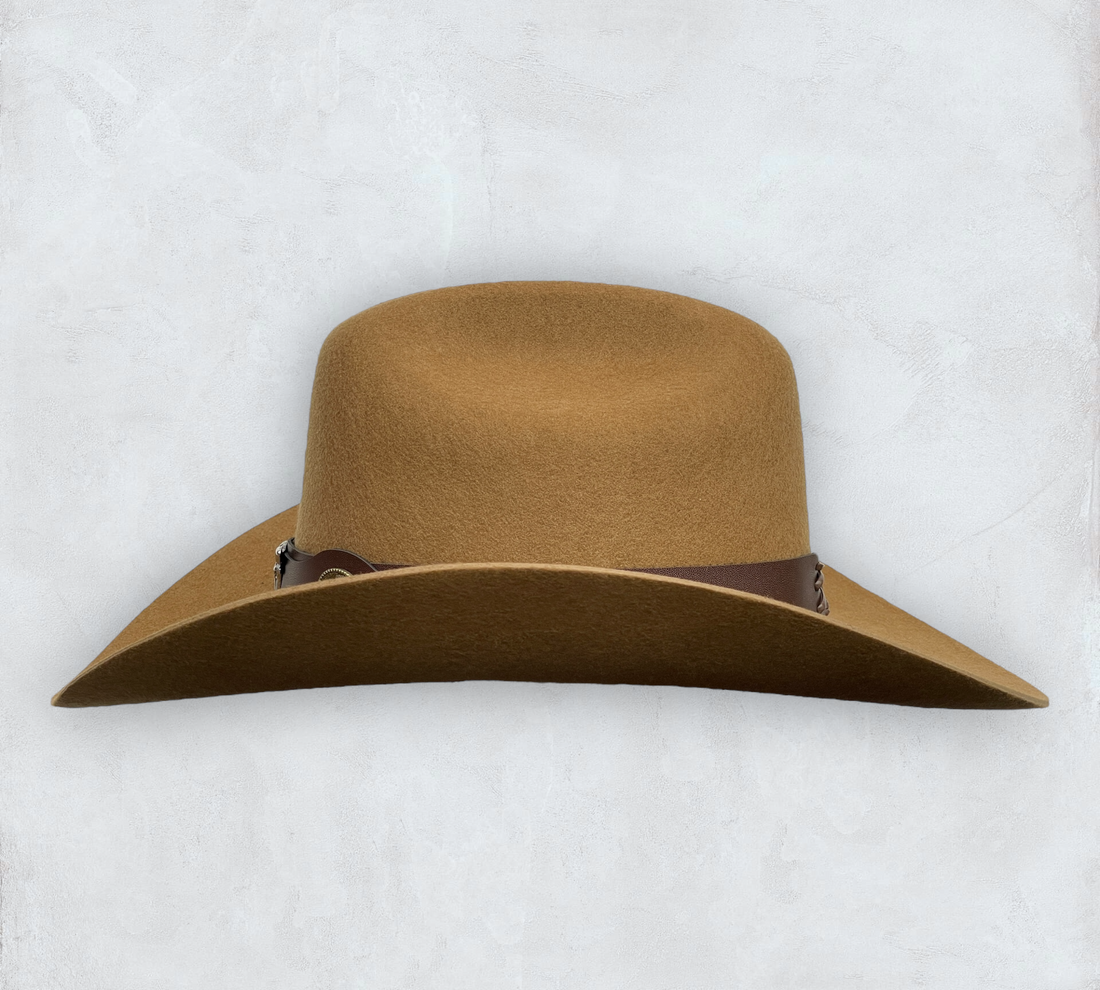 Brown cowboy hat made of high-quality felt with leather band and metal bull head