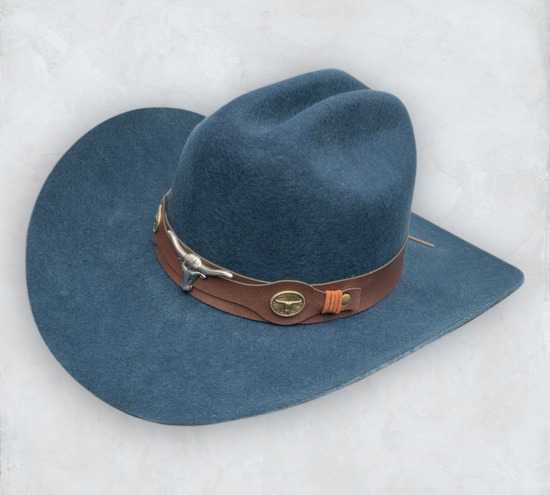 Blue cowboy hat made of high-quality felt with leather band and metal bull head