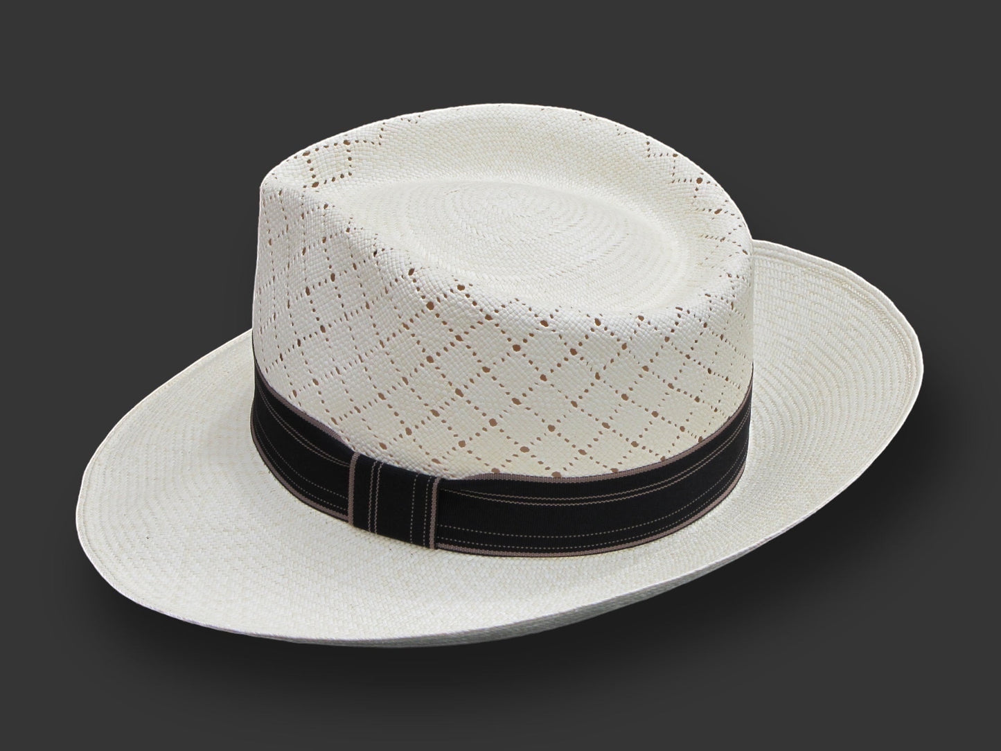 TomHats Havana Panama hat made of light-colored straw with a ventilated diamond pattern and a black hatband.