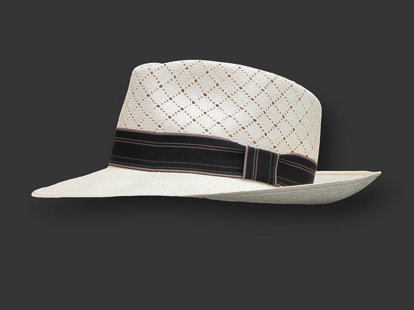 TomHats Havana Panama hat made of light-colored straw with a ventilated diamond pattern and a black hatband.